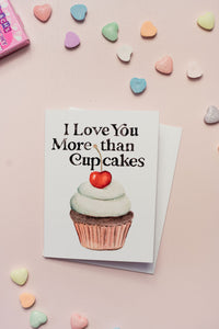 I Love You More than Cupcakes Greeting Card - White